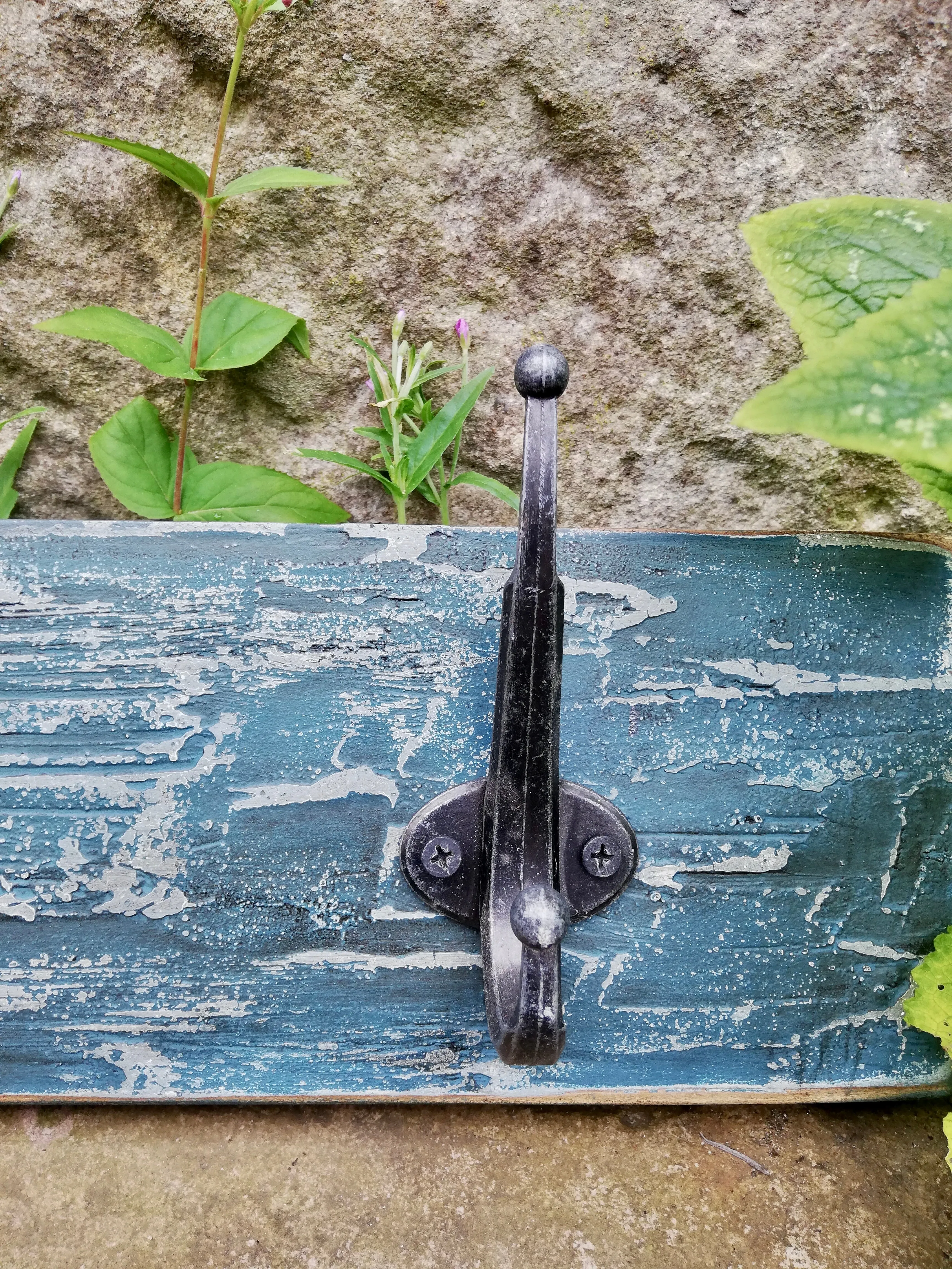 Hand made coat rack with 3 hooks.