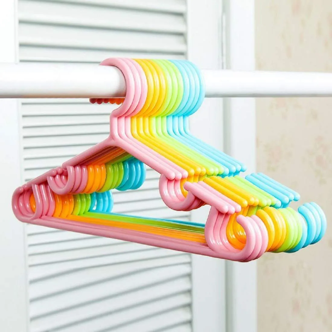 Kuber Industries Plastic 15 Pieces Baby Hanger Set for Wardrobe|Wide Plastic & Anti Rust Hooks|Multipurpose Hanger Organizer (Peach)